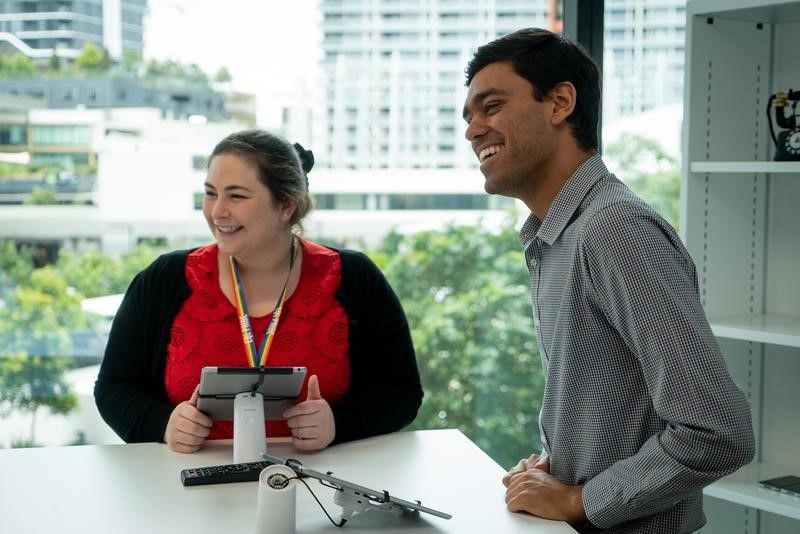 Two employees sitting at a table