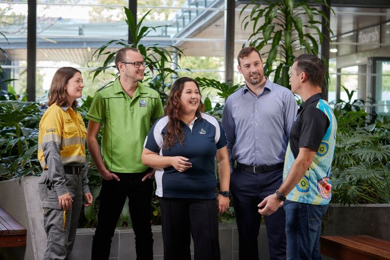 Small group employees in foyer