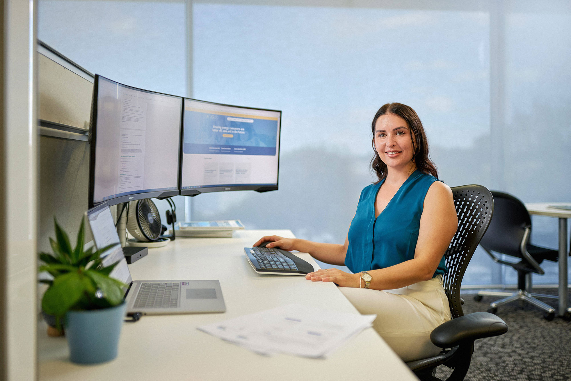 Naomi at desk with computer