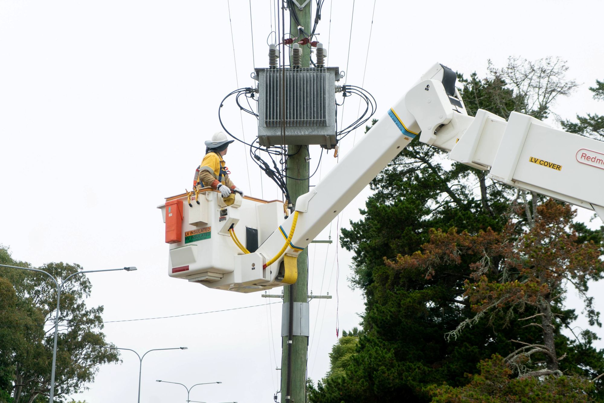 Crew working on powerlines in truck