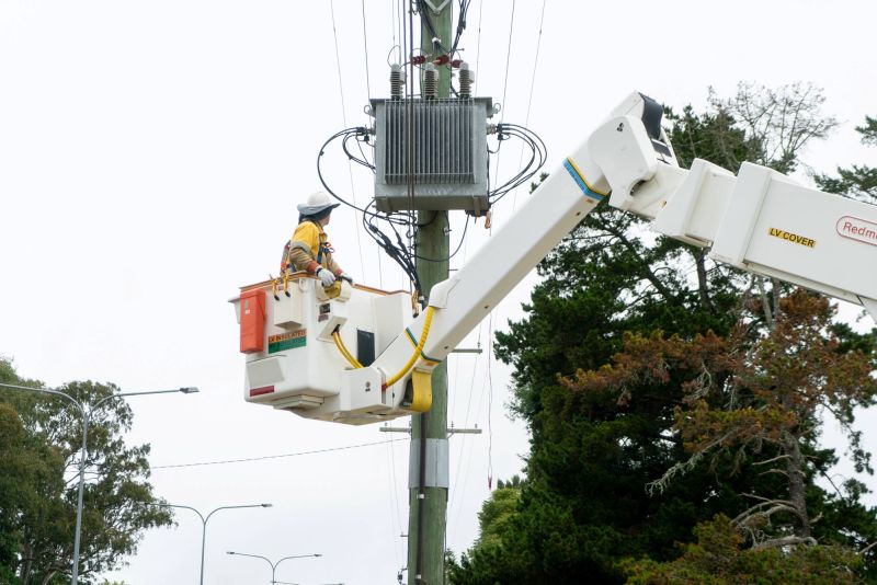 Crew working on powerlines in truck