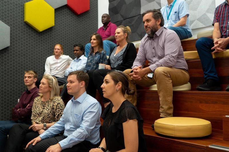 Group of employees in atrium close-up